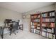Bedroom features a desk, computer setup and a bookcase, a great area for work and study at 10865 Glenhurst Pass, Duluth, GA 30097