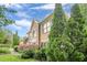 Brick home featuring a meticulously maintained lawn and attractive landscaping at 10865 Glenhurst Pass, Duluth, GA 30097