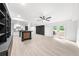 Open basement layout featuring a large area and a bar with black and wood accents, and a door to the exterior at 30 Roseberry Dr, Stockbridge, GA 30281