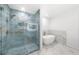 Stunning bathroom featuring a large glass enclosed shower and standalone tub at 30 Roseberry Dr, Stockbridge, GA 30281