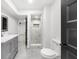 Stylish bathroom with gray vanity, marbled shower, and modern fixtures at 30 Roseberry Dr, Stockbridge, GA 30281