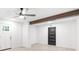 Bedroom with a decorative beam and light-filled window at 30 Roseberry Dr, Stockbridge, GA 30281