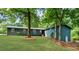 Single story home with beautiful lawn and mature trees at 30 Roseberry Dr, Stockbridge, GA 30281