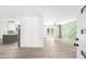 Bright and airy living room with modern floors and decorative wall feature at 30 Roseberry Dr, Stockbridge, GA 30281