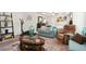 Comfortable living area with dual sofas and decorator items at 3796 Village Crossing Ln, Ellenwood, GA 30294