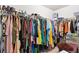 Functional walk-in closet providing plenty of room for clothing and personal items at 3796 Village Crossing Ln, Ellenwood, GA 30294