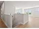 Bright hallway with hardwood floors and lots of natural light at 900 Melody Ridge Ln, Buford, GA 30518