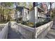 Exterior of Condo showing beautiful grounds, lush plants and mature trees with access by walkway at 1482 N Crossing N Cir, Atlanta, GA 30329