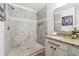 Bathroom featuring a walk-in shower and single sink vanity with granite countertops at 260 Westview Sw Pl, Atlanta, GA 30314