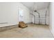Spacious garage with steps leading to an interior room, and an automatic garage door opener at 260 Westview Sw Pl, Atlanta, GA 30314