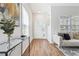 Inviting entryway and living area with hardwood floors, ample natural light, and a comfortable sofa at 260 Westview Sw Pl, Atlanta, GA 30314