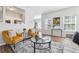 Inviting living room with hardwood floors, neutral furniture, and an open layout to the kitchen at 260 Westview Sw Pl, Atlanta, GA 30314