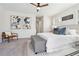 Comfortable primary bedroom features a ceiling fan, light gray walls, and soft decor at 260 Westview Sw Pl, Atlanta, GA 30314