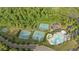Wide aerial perspective of community amenities including tennis, basketball, pool, and playground at 263 Jefferson Ave, Canton, GA 30114