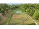 Aerial view featuring a well-maintained baseball field and basketball court at 263 Jefferson Ave, Canton, GA 30114