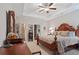 Spacious main bedroom with tray ceilings, carpet and staircase access at 263 Jefferson Ave, Canton, GA 30114