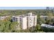 Aerial view of multi-story building surrounded by lush greenery at 1 Biscayne Nw Dr # 112, Atlanta, GA 30309