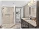 Updated bathroom features a granite countertop vanity and a spacious walk-in shower at 1 Biscayne Nw Dr # 112, Atlanta, GA 30309