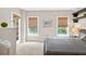 Bright bedroom with natural light, and outdoor views from the windows at 1 Biscayne Nw Dr # 112, Atlanta, GA 30309