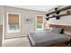 Comfortable bedroom with natural light, and stylish decor at 1 Biscayne Nw Dr # 112, Atlanta, GA 30309
