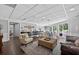 Relaxing common area with lounge seating, breakfast bar, and access to an outdoor patio at 1 Biscayne Nw Dr # 112, Atlanta, GA 30309
