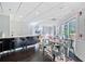 Well-appointed common room with a bar, tables, chairs, and a bright, inviting atmosphere at 1 Biscayne Nw Dr # 112, Atlanta, GA 30309