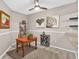 Cozy dining area features stylish decor, ceiling fan, and natural light at 1 Biscayne Nw Dr # 112, Atlanta, GA 30309