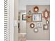 Charming hallway with decorative mirrors and neutral paint colors at 1 Biscayne Nw Dr # 112, Atlanta, GA 30309