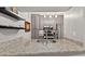 Well-lit kitchen features a speckled granite countertop, stainless steel appliances, and ample cabinet space at 1 Biscayne Nw Dr # 112, Atlanta, GA 30309
