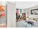Cozy living room featuring stylish decor, comfortable seating, and unique artwork at 1 Biscayne Nw Dr # 112, Atlanta, GA 30309