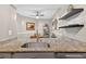 Stylish wet bar features granite countertops and a stainless steel faucet at 1 Biscayne Nw Dr # 112, Atlanta, GA 30309