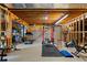 Unfinished basement used as an in-home gym with workout equipment at 1254 Hadaway Garden Nw Dr, Kennesaw, GA 30152