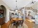Open breakfast nook featuring a wood table and chairs, leading to living room and kitchen at 1254 Hadaway Garden Nw Dr, Kennesaw, GA 30152