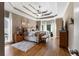 Spacious main bedroom with trey ceilings, a ceiling fan, and an abundance of natural light at 1254 Hadaway Garden Nw Dr, Kennesaw, GA 30152