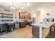 Bright kitchen features granite counters, stainless appliances and cozy breakfast nook at 3350 Clawing Hawk Way, Douglasville, GA 30135