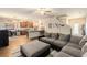 Open-concept living area seamlessly connects to the kitchen and dining space, perfect for entertaining at 3350 Clawing Hawk Way, Douglasville, GA 30135
