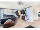 Spacious main bedroom features carpeted floors, cozy sitting area and plenty of natural light at 3350 Clawing Hawk Way, Douglasville, GA 30135