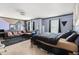 Spacious bedroom has carpeted floors and sitting area with a full-length mirror at 3350 Clawing Hawk Way, Douglasville, GA 30135