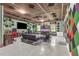 Spacious bonus room with custom ceiling, large TV, fish tank, and sound dampening features at 400 Little John Nw Dr, Lilburn, GA 30047