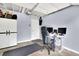 The garage features an organized workspace with desk and storage at 1031 Washington Ave, Woodstock, GA 30188
