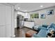 Cozy living area featuring a modern kitchenette and comfortable seating at 1031 Washington Ave, Woodstock, GA 30188