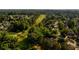 Overhead angle of the community showcasing golf course frontage and gorgeous lush landscaping at 11255 Knollwood Bnd, Johns Creek, GA 30097