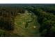 Expansive golf course view featuring lush green fairways and strategically placed sand traps at 11255 Knollwood Bnd, Johns Creek, GA 30097