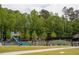 Outdoor shot of a playground in a public park at 11255 Knollwood Bnd, Johns Creek, GA 30097