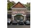 Exterior of Pampas Steakhouse with stone facade and parking at 11255 Knollwood Bnd, Johns Creek, GA 30097