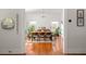Bright dining room with hardwood floors, a chandelier, and windows offering natural light at 307 S Mcdonough St, Decatur, GA 30030