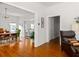 Bright open-plan interior showing dining and living room spaces with hardwood floors at 307 S Mcdonough St, Decatur, GA 30030