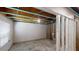 Unfinished basement with wooden frames, insulation, open ceilings and potential for customization at 3157 Peartree Nw Dr, Acworth, GA 30101