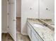 The updated bathroom has a single granite vanity at 3157 Peartree Nw Dr, Acworth, GA 30101