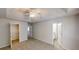 A bright bedroom features two open doors, and a ceiling fan at 3157 Peartree Nw Dr, Acworth, GA 30101